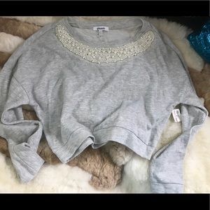 Delia’s crop sweatshirt with beaded neckline